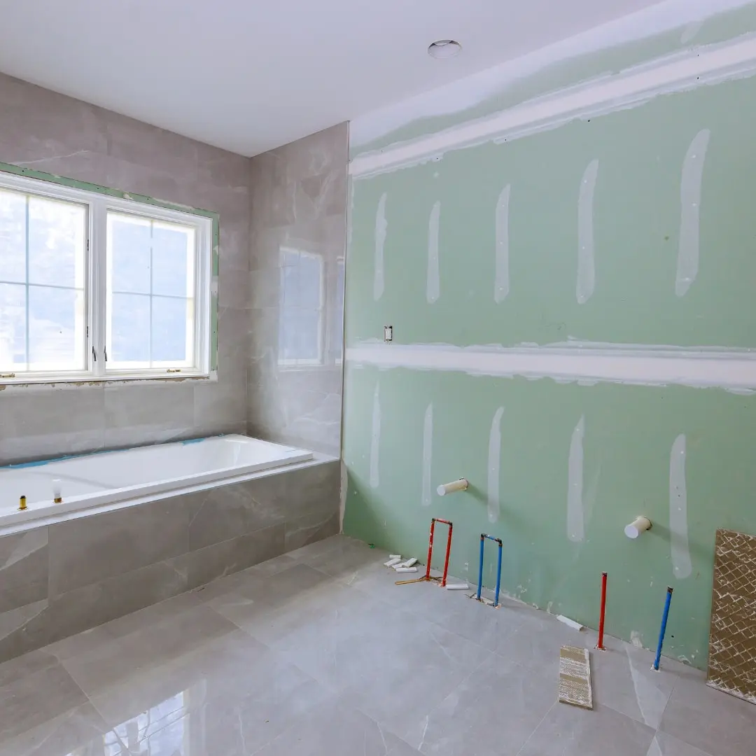 Bathroom walls rebuilt with moisture-resistant board