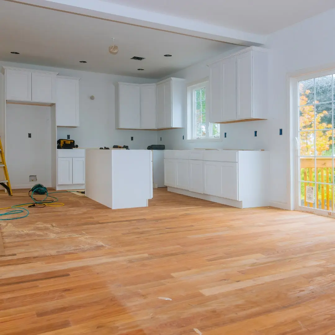Renovated rental kitchen with new wood floors