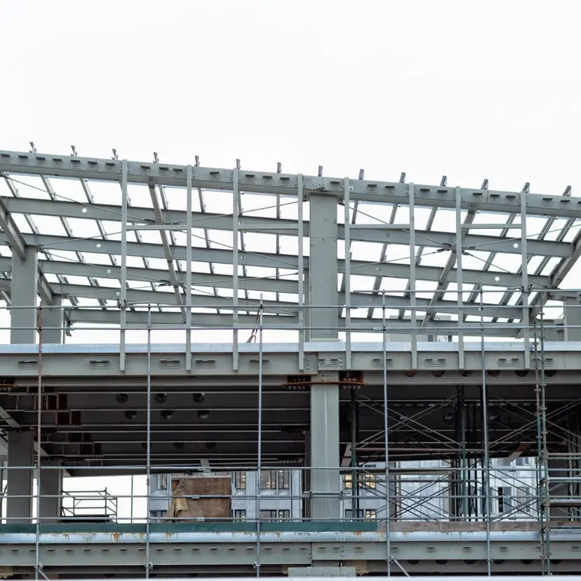 Steel-framed building under construction after passing its framing inspection