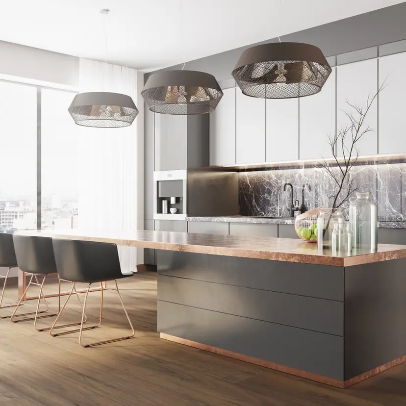 Modern kitchen with a large island and pendant lights in a Zachary-area home