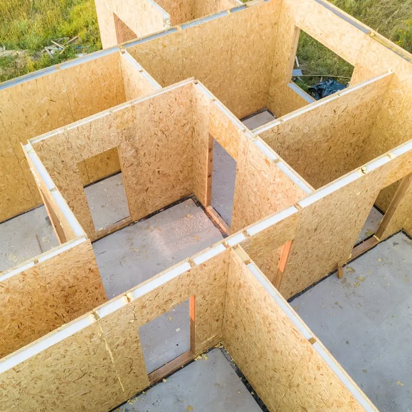 New sheathed walls of a home addition seen from above